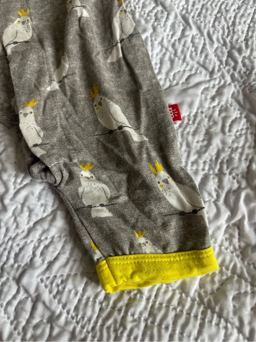 Magnetic Me Gray One-Piece Footie with Yellow Trim and Cockatoo Print